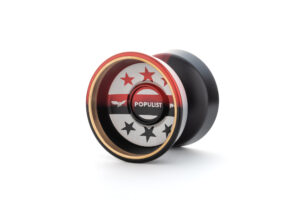 A red and black Populist Yo-Yo, photographed on an endless white background. Parts of the yo-yo fade from red to black. The yo-yo has white engraving on it with stars and the word "Populist" written on it. It has brass rings.