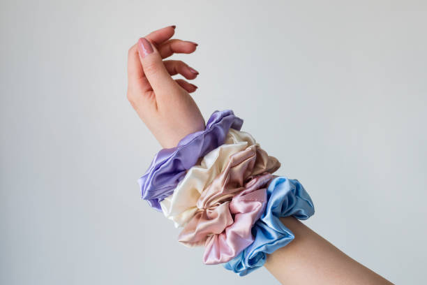 Silk elastic bands on woman's arm.