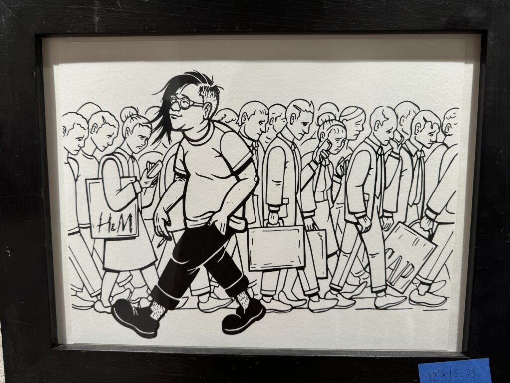 A self-portrait of Paul Escolar walking past a line of people. The people are all in corporate attire and looking at their phones. Paul is in a t-shirt and looking ahead hopefully and relaxed. The artwork is black and white. Paul's character pops out from the busy background by giving more black fills to his hair, pants, and shoes. 